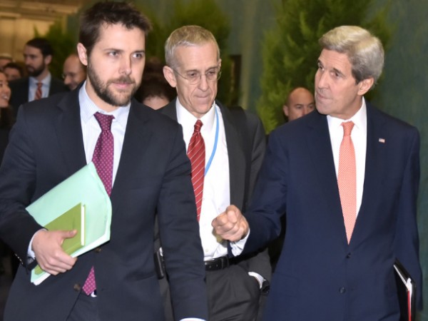 US Secretary of State John Kerry, right, walks with White House senior advisor Brian Deese, left, and US Special Envoy for Climate Change Todd Stern, centre, to attend a meeting with French Foreign Minister Laurent Fabius during the COP 21 United Nations conference on climate change at Le Bourget, on the outskirts of Paris, on Thursday Dec. 10, 2015. (Mandel Ngan Pool via AP)