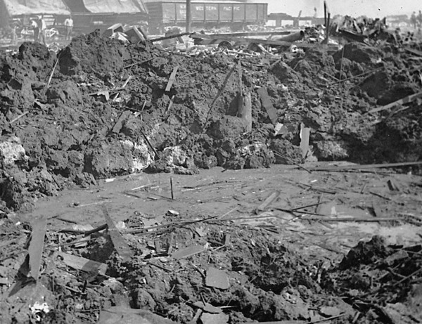 Crater left by explosion of truck containing 6.5 tons of dynamite, Roseburg, Oregon, August 7, 1959. ba015174; 57 MB; Gray 16 TIFF.