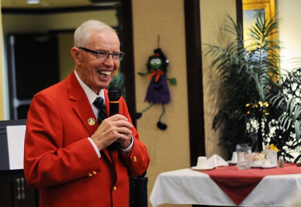 George Garrett, 81, tells stories from his past to the crowd gathered in the Peninsula Retirement Residence Friday afternoon. Aaron Hinks photo