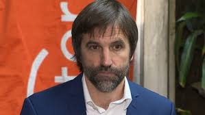 Heritage minister retreats from licensing all news media