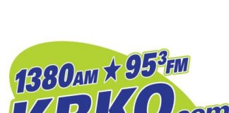 Tim Hunter of KRKO talks with former on-air personality Ric Hanson in celebration of the stations 100th Birthday