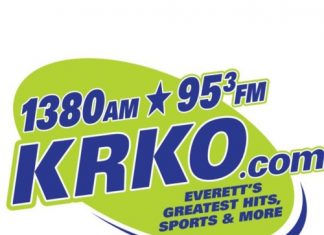 Tim Hunter of KRKO talks with former on-air personality Ric Hanson in celebration of the stations 100th Birthday