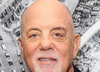 Yikes! What happened to Billy Joel? He fell down like someone who just got their ninth booster.